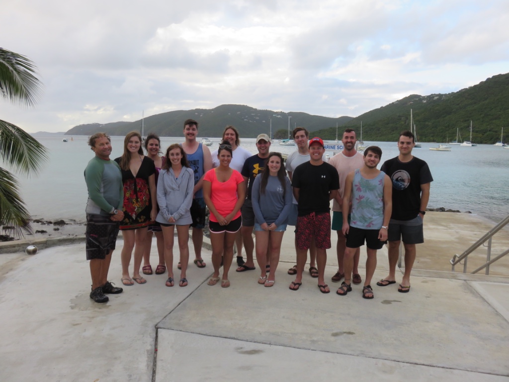 Group photo in front of water